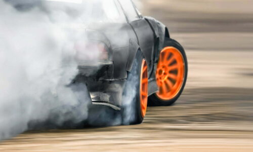 race drift car burning tires speed track scaled